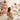 Woman using smartphone to view Instagram grid on a white background with spa and salon products floating around her