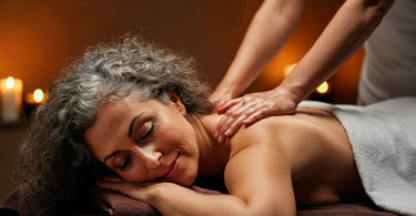 A woman receiving a calming spa massage, perfect for relieving menopause symptoms.