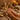 Massage therapist receiving foot care treatment during break at spa
